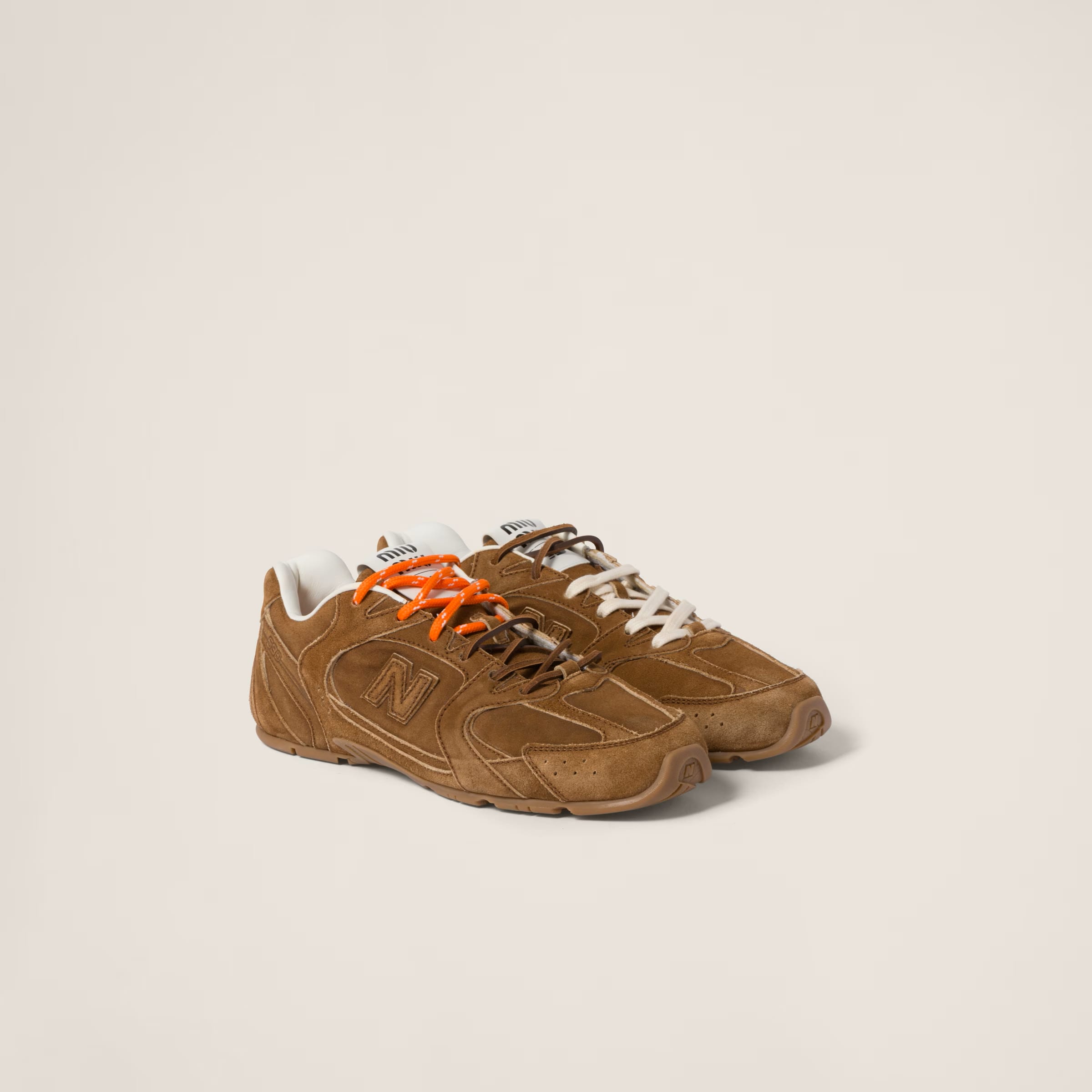 New Balance X Miu Miu 530 SL suede sneakers in Cinnamon, €950 (approximately P63,611.050, MIU MIU, miumiu.com